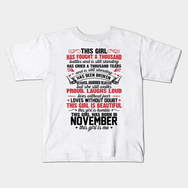 This Girl Was Born In November Kids T-Shirt by xylalevans